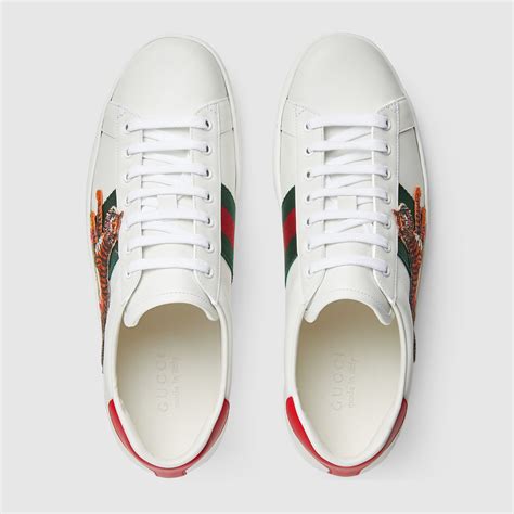 fake gucci heart sneakers|Gucci ace tiger sneakers.